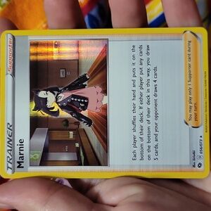 Pokemon Trainer Marnie Holo 56/73